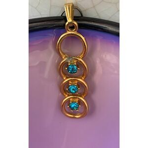 Vintage Bluish-Green Rhinestones and Gold Circles pendant, Unmarked